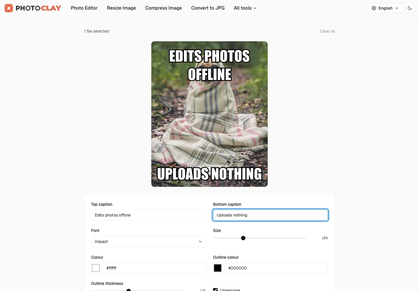 Meme Generator with top and bottom captions in white Impact text over a photo of a dog wrapped in a blanket